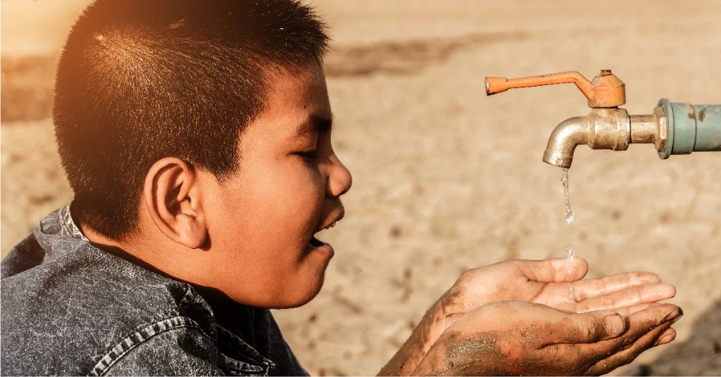 Child drinking safe clean water